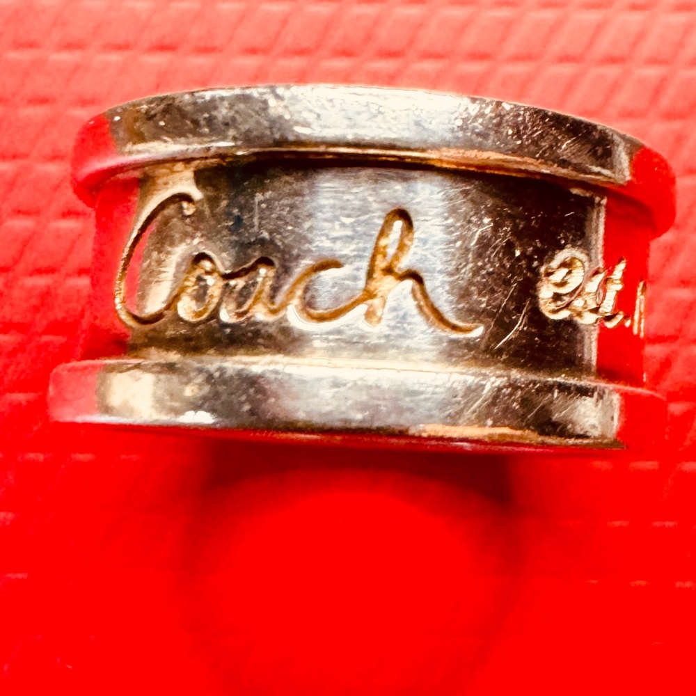 Coach Brand Sterling Silver Classic “1941” Wide Band
Ring Size 6